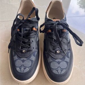 Coach women’s Navy Signature C Court Sneakers